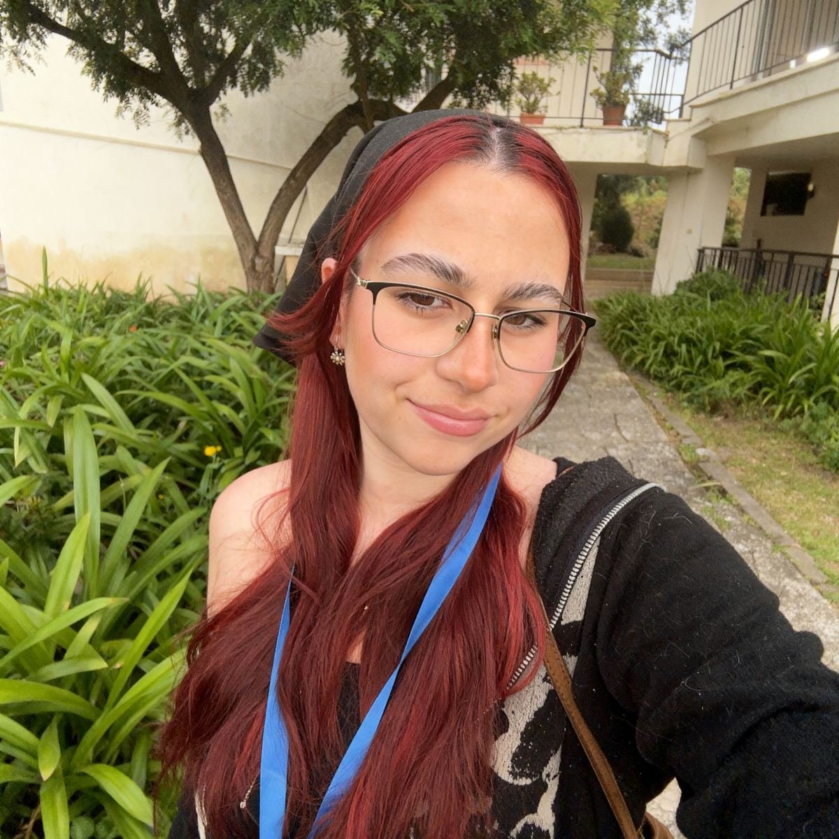 Tati, smiling